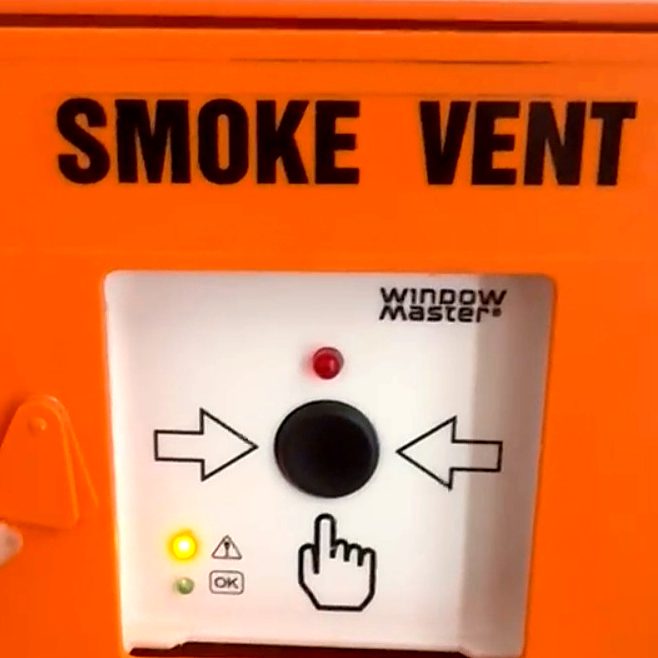 Smoke vent fireman's override switch fitted as part of an AOV smoke ventilation system